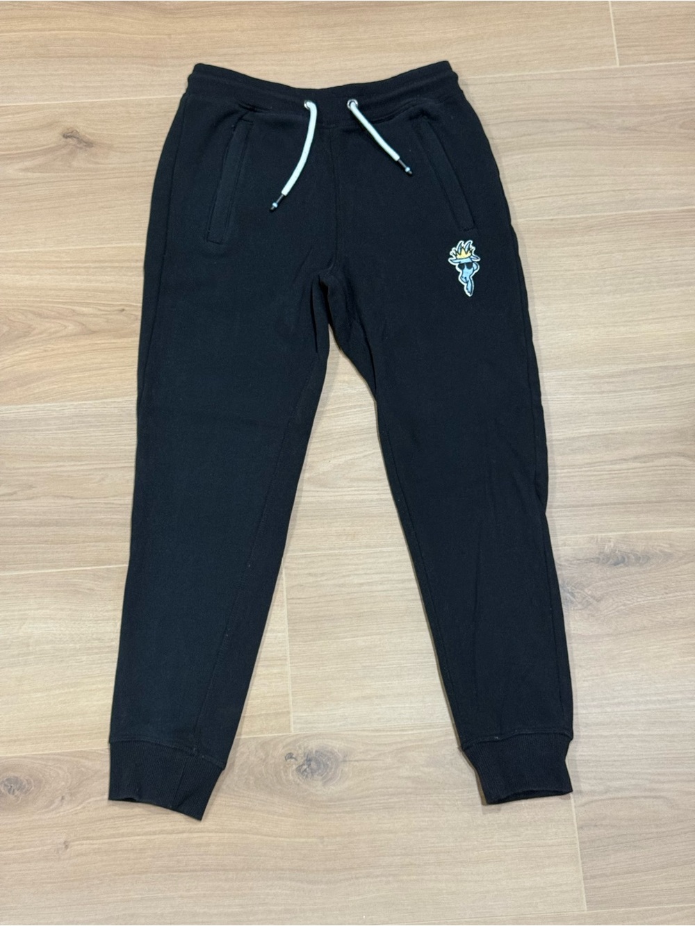GOAT Kids Black Jogger Sweatpants with Accent Patch